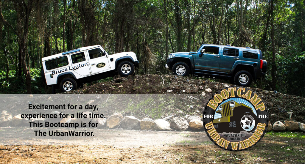 Two 4WD vehicles face to face along an off road track